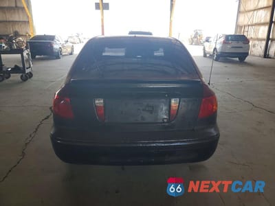 Zdjęcie 6 z 12 samochodu: 2003 HYUNDAI ELANTRA GT VIN:KMHDN55D63U089710 - miniatura