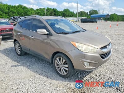 Czwarte zdjęcie samochodu z boku: 2010 HYUNDAI TUCSON LIMITED VIN:KM8JU3AC8AU075232 - miniatura