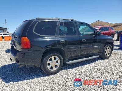 Trzecie zdjęcie samochodu z tyłu: 2002 GMC ENVOY VIN:1GKDT13S222396133 - miniatura