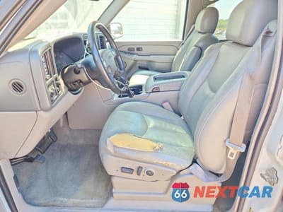 Zdjęcie 7 z 12 samochodu: 2004 GMC YUKON VIN:1GKEC13Z04J279984 - miniatura