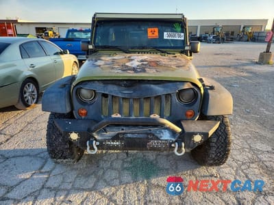Piąte zdjęcie samochodu w środku: 2010 JEEP WRANGLER UNLIMITED SPORT VIN:1J4BA3H13AL202040 - miniatura