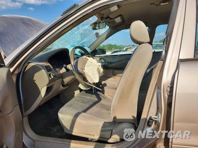 Zdjęcie 7 z 13 samochodu: 2000 TOYOTA COROLLA VE VIN:1NXBR12E2YZ373487 - miniatura