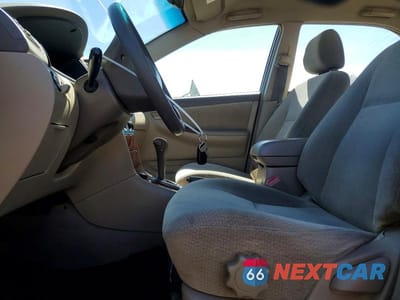 Zdjęcie 7 z 11 samochodu: 2004 TOYOTA COROLLA LE VIN:2T1BR32E74C276406 - miniatura