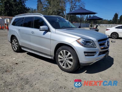 Czwarte zdjęcie samochodu z boku: 2016 MERCEDES-BENZ GL 450 4MATIC VIN:4JGDF6EE5GA681022 - miniatura