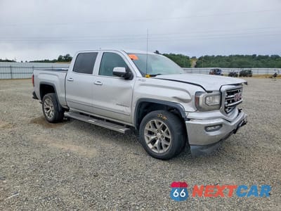 Czwarte zdjęcie samochodu z boku: 2018 GMC SIERRA K1500 SLT VIN:3GTU2NEC1JG637228 - miniatura