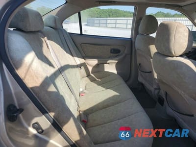Zdjęcie 10 z 12 samochodu: 2002 HYUNDAI ELANTRA GLS VIN:KMHDN45D72U306688 - miniatura
