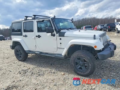 Czwarte zdjęcie samochodu z boku: 2012 JEEP WRANGLER UNLIMITED SAHARA VIN:1C4BJWEG3CL277680 - miniatura
