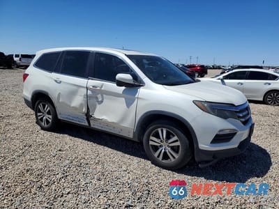 Czwarte zdjęcie samochodu z boku: 2016 HONDA PILOT VIN:5FNYF6H87GB076664 - miniatura