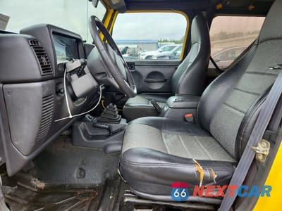 Zdjęcie 7 z 13 samochodu: 2000 JEEP WRANGLER / TJ SPORT VIN:1J4FA49S3YP749004 - miniatura