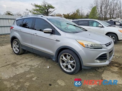 Czwarte zdjęcie samochodu z boku: 2013 FORD ESCAPE TITANIUM VIN:1FMCU9J90DUD63315 - miniatura