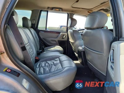 Zdjęcie 11 z 14 samochodu: 2002 JEEP GRAND CHEROKEE OVERLAND VIN:1J8GW68J12C183285 - miniatura