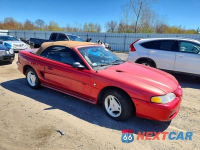 Czwarte zdjęcie samochodu z boku: 1996 FORD MUSTANG VIN:1FALP444XTF163081 - miniatura