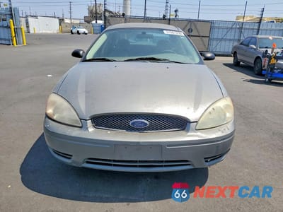 Piąte zdjęcie samochodu w środku: 2004 FORD TAURUS LX VIN:1FAFP52274G187595 - miniatura