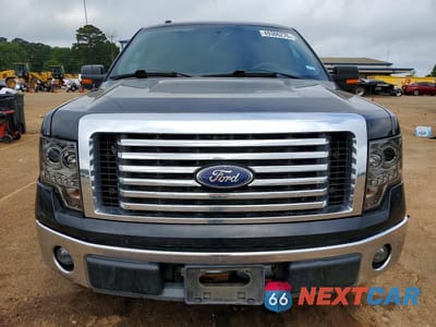 Piąte zdjęcie samochodu w środku: 2011 FORD F150 SUPERCREW VIN:1FTFW1CF0BFA51156 - miniatura