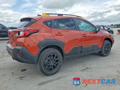 Trzecie zdjęcie samochodu z tyłu: 2024 SUBARU CROSSTREK WILDERNESS VIN:4S4GUHT60R3735909 - miniatura