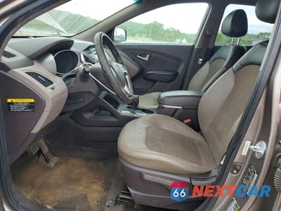 Zdjęcie 7 z 13 samochodu: 2013 HYUNDAI TUCSON GLS VIN:KM8JU3AC1DU563314 - miniatura