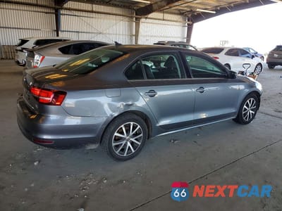 Trzecie zdjęcie samochodu z tyłu: 2017 VOLKSWAGEN JETTA SE VIN:3VWDB7AJ3HM291790 - miniatura