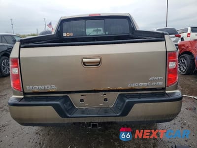 Zdjęcie 6 z 12 samochodu: 2010 HONDA RIDGELINE RTS VIN:5FPYK1F43AB010318 - miniatura