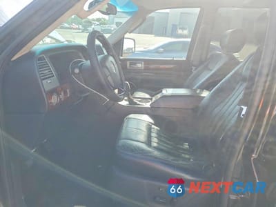 Zdjęcie 7 z 13 samochodu: 2003 LINCOLN NAVIGATOR VIN:5LMFU27R13LJ11988 - miniatura