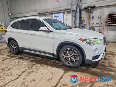 Czwarte zdjęcie samochodu z boku: 2017 BMW X1 XDRIVE28I VIN:WBXHT3C35H5F68430 - miniatura