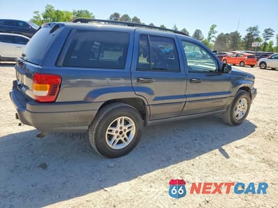 Trzecie zdjęcie samochodu z tyłu: 2003 JEEP GRAND CHEROKEE LAREDO VIN:1J4GX48S63C581282 - miniatura