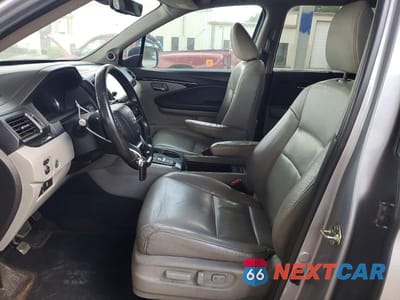 Zdjęcie 7 z 12 samochodu: 2020 HONDA PILOT TOURING VIN:5FNYF5H64LB012746 - miniatura