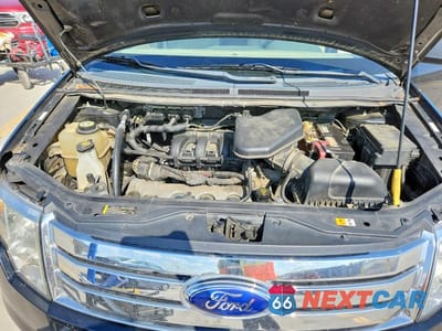 Zdjęcie 12 z 13 samochodu: 2007 FORD EDGE SE VIN:2FMDK36C27BB34351 - miniatura