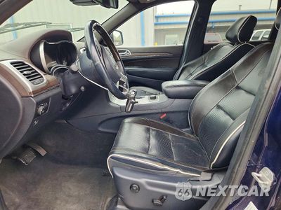 Zdjęcie 7 z 13 samochodu: 2014 JEEP GRAND CHEROKEE OVERLAND VIN:1C4RJFCM0EC347629 - miniatura