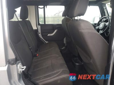 Zdjęcie 11 z 12 samochodu: 2017 JEEP WRANGLER UNLIMITED SAHARA VIN:1C4BJWEG0HL540294 - miniatura