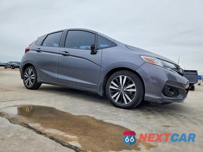 Czwarte zdjęcie samochodu z boku: 2019 HONDA FIT EXL VIN:3HGGK5H91KM713726 - miniatura
