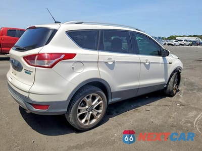 Trzecie zdjęcie samochodu z tyłu: 2016 FORD ESCAPE TITANIUM VIN:1FMCU0J94GUB52988 - miniatura