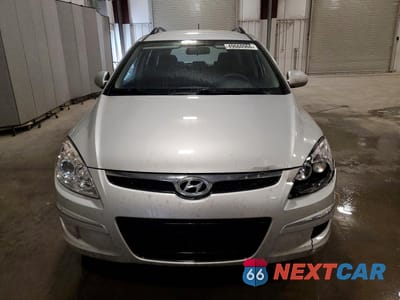 Piąte zdjęcie samochodu w środku: 2010 HYUNDAI ELANTRA TOURING GLS VIN:KMHDC8AE7AU054855 - miniatura