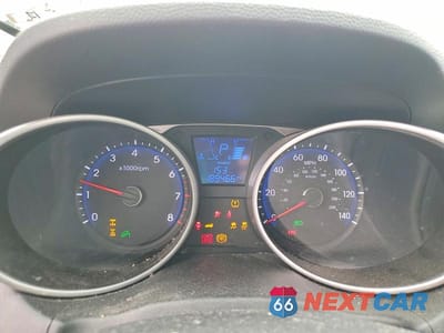 Zdjęcie 9 z 13 samochodu: 2013 HYUNDAI TUCSON LIMITED VIN:KM8JUCAC6DU690592 - miniatura