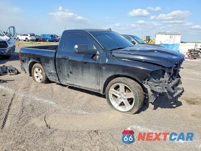 Czwarte zdjęcie samochodu z boku: 2014 RAM 1500 SPORT VIN:3C6JR6CT6EG127221 - miniatura