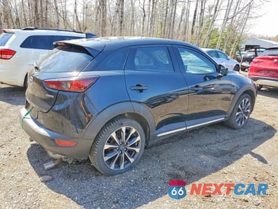 Trzecie zdjęcie samochodu z tyłu: 2021 MAZDA CX-3 GRAND TOURING VIN:JM1DKFD77M1510139 - miniatura