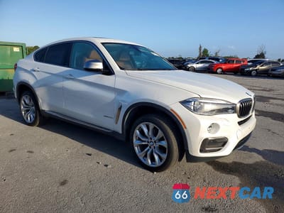 Czwarte zdjęcie samochodu z boku: 2015 BMW X6 XDRIVE35I VIN:5UXKU2C57F0F94838 - miniatura