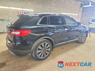 Trzecie zdjęcie samochodu z tyłu: 2016 LINCOLN MKX BLACK LABEL VIN:2LMPJ7JP9GBL23150 - miniatura