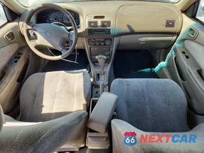 Zdjęcie 8 z 12 samochodu: 2001 TOYOTA COROLLA LE VIN:1NXBR12E81Z471316 - miniatura