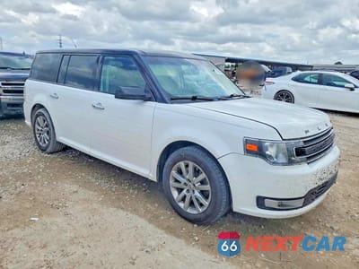 Czwarte zdjęcie samochodu z boku: 2016 FORD FLEX VIN:2FMGK5C81GBA23881 - miniatura