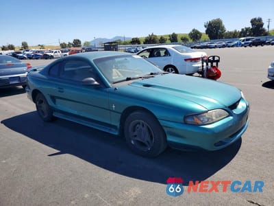 Czwarte zdjęcie samochodu z boku: 1998 FORD MUSTANG VIN:1FAFP4040WF186523 - miniatura