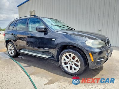 Czwarte zdjęcie samochodu z boku: 2011 BMW X5 XDRIVE35I VIN:5UXZV4C55BL408632 - miniatura