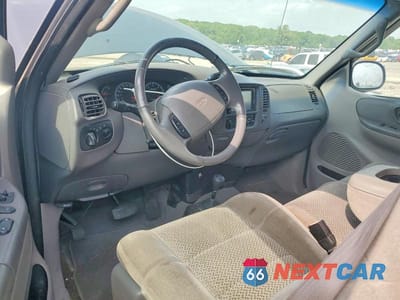 Zdjęcie 8 z 12 samochodu: 2002 FORD F150 VIN:1FTRX18L12NA53383 - miniatura