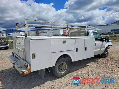 Trzecie zdjęcie samochodu z tyłu: 2013 FORD F350 SUPER DUTY VIN:1FDRF3H68DEA61052 - miniatura
