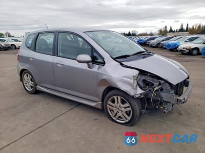 Czwarte zdjęcie samochodu z boku: 2007 HONDA FIT S VIN:JHMGD38647S030418 - miniatura