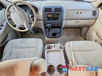 Zdjęcie 8 z 11 samochodu: 2004 KIA SEDONA LX VIN:KNDUP131746602825 - miniatura