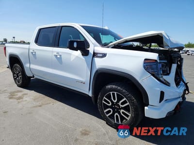 Czwarte zdjęcie samochodu z boku: 2023 GMC SIERRA K1500 AT4 VIN:3GTUUEE8XPG222178 - miniatura