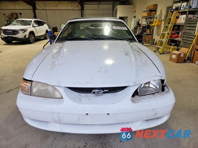 Piąte zdjęcie samochodu w środku: 1996 FORD MUSTANG VIN:1FALP4443TF195578 - miniatura