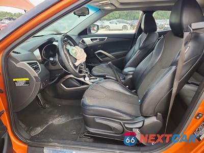 Zdjęcie 7 z 13 samochodu: 2012 HYUNDAI VELOSTER BASE VIN:KMHTC6AD6CU030136 - miniatura