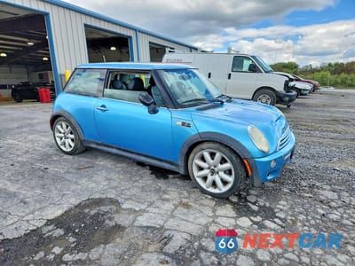 Czwarte zdjęcie samochodu z boku: 2003 MINI COOPER S VIN:WMWRE33413TD58641 - miniatura