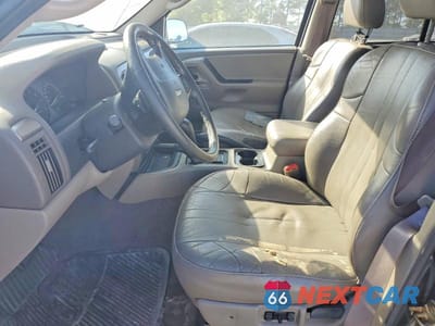 Zdjęcie 7 z 13 samochodu: 2004 JEEP GRAND CHEROKEE LAREDO VIN:1J4GW48N04C319420 - miniatura
